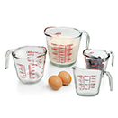 MEASURING CUP, CLEAR WITH RED DECORATION, GLASS